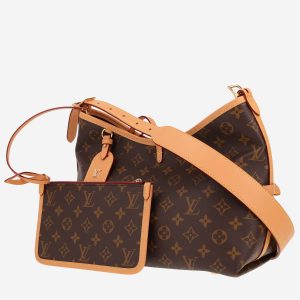 Sac bandoulière Louis Vuitton Carryall petit modèle en toile monogram marron et cuir naturel